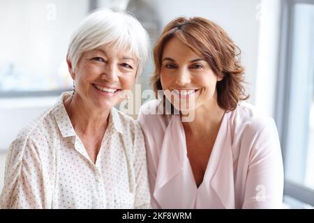 I love my mom for everything shes done for me. a woman spending time with her elderly mother. Stock Photo