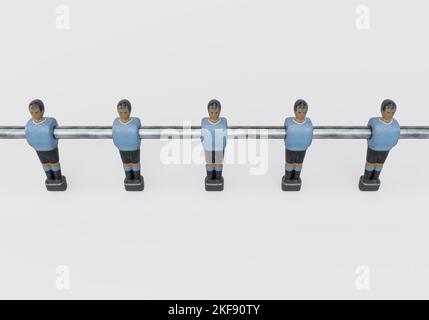 A single line of worn figurines from a vintage foosball or table football table styled in kit resembling the Uruguay national team - 3D render Stock Photo