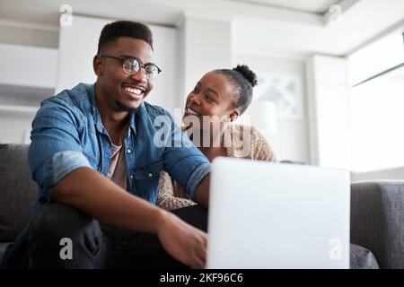 Laptop, happy and internet with a black couple online, browsing social media or looking for a movie to watch. Ecommerce, computer and series with a Stock Photo