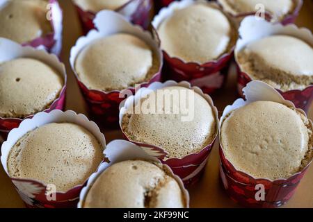 A Stack of Freshly Baked Coffee Flavored Cupcakes Stock Photo
