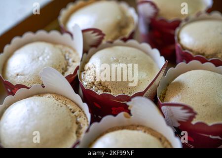 A Stack of Freshly Baked Coffee Flavored Cupcakes Stock Photo