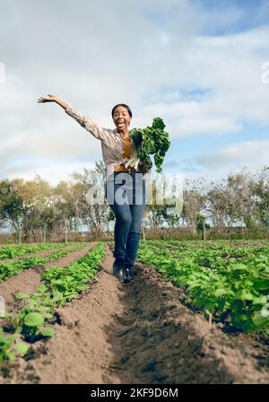 Happy woman, portrait and celebrate agriculture, harvest and nature in gardening environment, plant field or sustainability in countryside. Excited Stock Photo