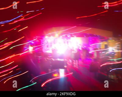 Modern futuristic vibrant night club  blurred multicolored background. Stock Photo