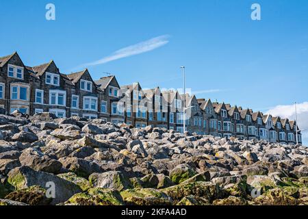 Long terrace of houses on seafront, Morecambe Bay, Lancashire, UK Stock Photo