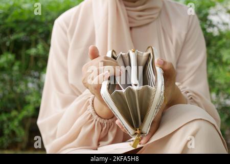 women hand open an empty wallet  Stock Photo