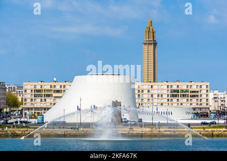 The Volcan theater, the Oscar Niemeyer public library, the steeple of St. Joseph's Church and the water jet of the Commerce basin in Le Havre, France. Stock Photo