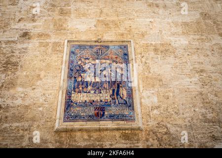 Ceramic tiles with San Esteban Protomartir on the wall of Church of Santa Caterina in Valencia, Spain Stock Photo