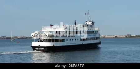 New York City, United States - September 17, 2022. Ferry from New York to Liberty Island with tourists who want to see the Statue of Liberty Stock Photo