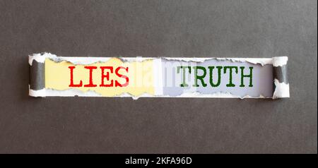 Crossing out Lies and writing Truth on a blackboard Stock Photo