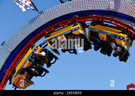 Riding Roller Coaster Upside Down with People The Royal Melbourne Show, Melbourne Victoria VIC, Australia Stock Photo