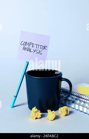 Hand writing sign Competitor Analysis. Word Written on Determine the Strength Weakness of Competitive Market Stock Photo