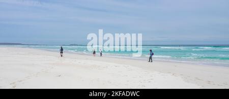 Walkers hiking the Cape to Cape Track  walking on Neretlis Beach Leeuwin-Naturaliste National Park Western Australia. Stock Photo