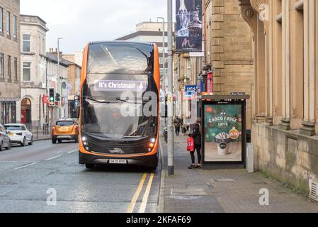 Manchester Road, Burnley Lancashire. The Burnley Bus Company's Witchway X43 service. Black and orange design vehicle. Stock Photo