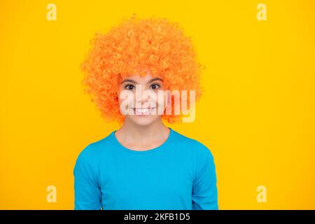 Close up portrait of the cute clown girl. Happy teenager portrait. Smiling girl. Stock Photo