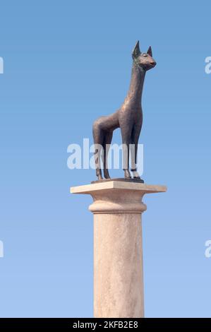 Modern, Bronze  statue of a deer in front of the Heart of Jesus church, Heviz, Hungary Hévíz is a spa town in Zala County, Hungary, Stock Photo