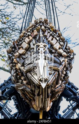 Rear section of a giant bee, made from knives and guns seized or handed over to the Police in the Manchester area. On display in Redditch town centre. Stock Photo