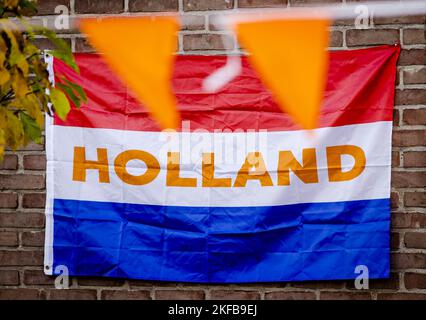 APELDOORN - Orange decorations in a street, in the run-up to the World Cup in Qatar. The Dutch national team will play its first group match against Senegal on November 21. ANP SEM VAN DER WAL netherlands out - belgium out Stock Photo