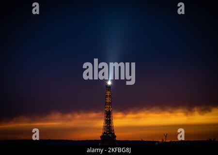 The photo shows the Eiffel Tower illuminated dusk in Paris, France, on October 30, 2022. Photo by Aurelien Morissard/ABACAPRESS.COM Stock Photo