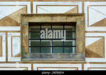 Small rectangular window with metal bars. From the Window of the World series. Stock Photo