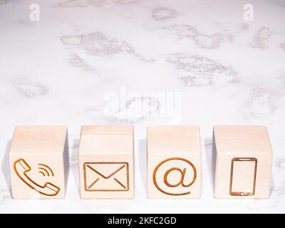 CONTACT US symbols as concept of feedback, support and communication Stock Photo