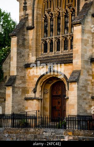St. Catharine's Catholic Church arched doorway and medieval tracery  in Chipping Campden, England. Stock Photo