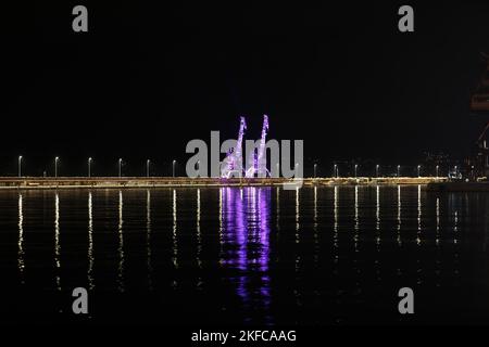 Zadar, Croatia, on November 17, 2022, Harbor Cranes illuminated in purple  for the International Premature Birth Awareness Day, in Rijeka, Croatia, on November 17, 2022. Photo: Goran KovacicPIXSELL Stock Photo