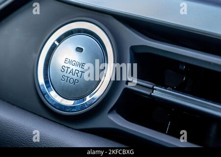 Engine start stop button in modern car close Stock Photo