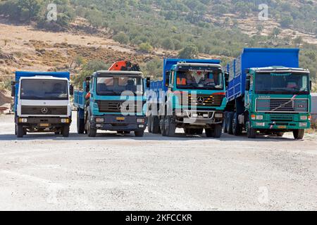Lorries parked in a row. Lesbos views October 2022. Autumn cym Stock Photo