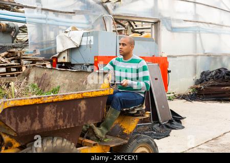 man working on Forklift loader Stock Photo