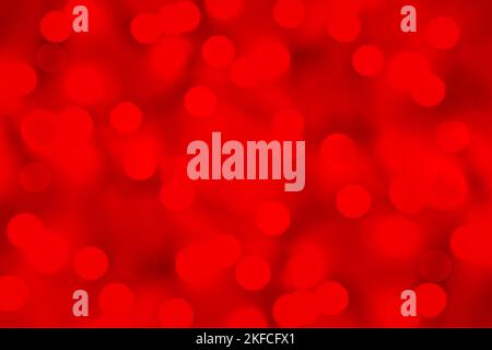 Glowing bokeh garland in bright red color. Christmas and new year background with soft focus Stock Photo