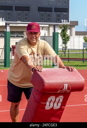 Former Matthew C. Perry High School head football coach, Frank A. Macias, stands on the football field of M.C. Perry high school at Marine Corps Air Station Iwakuni, September 7, 2022. Frank Macias was the head football coach at M.C. Perry high school from 2011 to August of 2022, and is now preparing to transfer to Port Campbell, Kentucky. Stock Photo