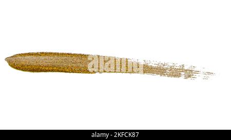 Brush stroke of golden paint with sparkles on a white background. Stock Photo