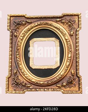 Isolated golden tintype picture frame for your photo. Old tintype framing in the center surrounded by modern oval frame with embossed floral design. Stock Photo