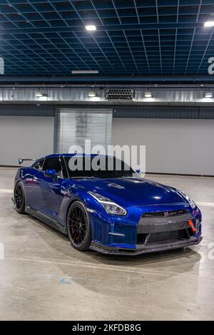 A blue Nissan GTR R35 during DAY1 World of Cars Stock Photo - Alamy