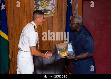 HONIARA, Solomon Islands (Sept. 9, 2022) – Capt. Hank Kim, Pacific Partnership 2022 mission commander, shakes hands with the Honorable Manasseh Sogavare, Prime Minister of the Solomon Islands, during a visit in support of Pacific Partnership 2022. Now in its 17th year, Pacific Partnership is the largest annual multinational humanitarian assistance and disaster relief preparedness mission conducted in the Indo-Pacific. Pacific Partnership is a unifying mission that fosters enduring friendships and cooperation among many nations. The year’s mission in Solomon Islands will include participants fr Stock Photo