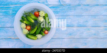 Pickles can be made with fresh cucumbers and pattison. Stock Photo