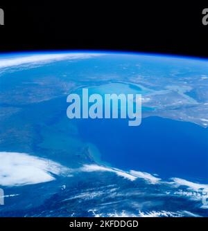 Earth's atmosphere from outer space. Blue turquoise hues with white clouds. Russia & the Volga River shown. Elements of this image furnished by NASA Stock Photo