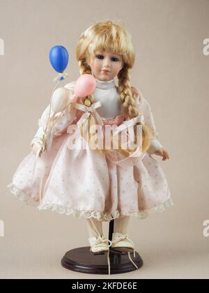 Blonde sale porcelain doll