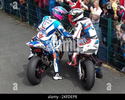 The high-angle view of two bikers - Isle of Man and senior Tourist Trophy Winners Stock Photo