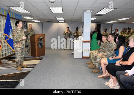 ROBINS AIR FORCE BASE, Ga. – Col. Lindsay Droz, 78th Air Base Wing commander, left, addresses those in attendance for the presentation of the Bronze Star Medal to Master Sgt. Mathue B. Snow, 78th Security Forces Squadron, at Robins Air Force Base, Georgia, Sept. 9, 2022. Snow was decorated for actions during the Jan. 5th, 2020, complex attack on Manda Bay, Kenya, where one American Soldier and two Department of Defense civilian contractors lost their lives, and six U.S. aircraft and one Kenyan aircraft were destroyed. Stock Photo