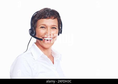 Happy female customer service representative. Portrait of mature female customer service representative smiling - copyspace. Stock Photo