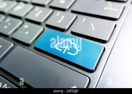 Cloud computing concept on computer keyboard. Loading and unloading data from a cloud service Stock Photo