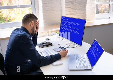 Blue BSOD Error At Computer. Malware Attack Stock Photo