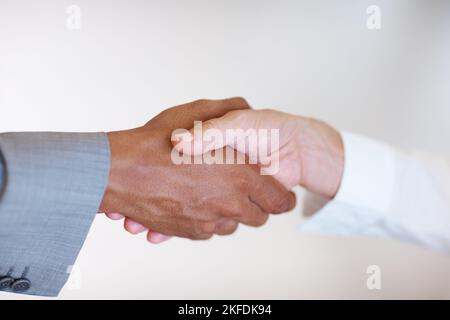 Congrats. Closeup of handshake between male and female executives. Stock Photo