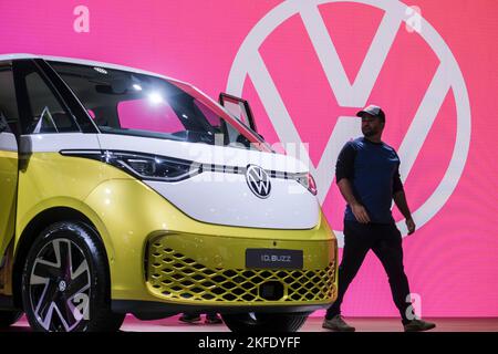 A 2022, Electric Volkswagen ID Buzz Cargo Van, which has a shiny gold