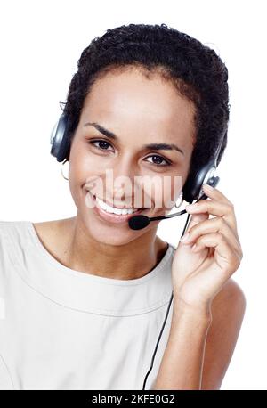 Ive got the answers you need. Studio shot of a young woman wearing a headset isolated on white. Stock Photo