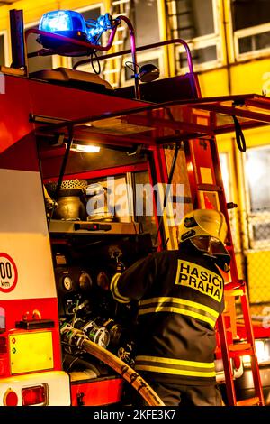 fireman during extinguishing of the fire Stock Photo