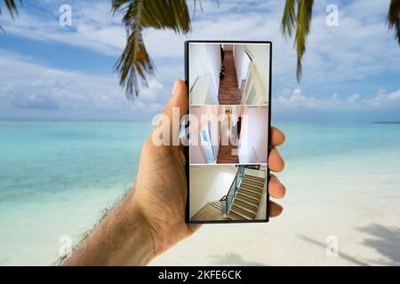 Security CCTV Cameras On Beach. Spy Gadgets Stock Photo