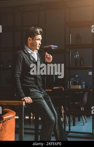 portrait of a young businessman full length in the interior Stock Photo
