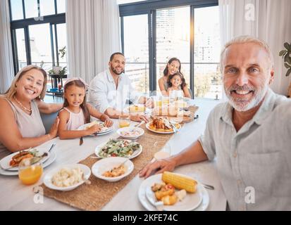 Big family, lunch selfie and food on table of dining room of modern apartment home for healthy meal, bonding love and celebrate event. Happy mother Stock Photo